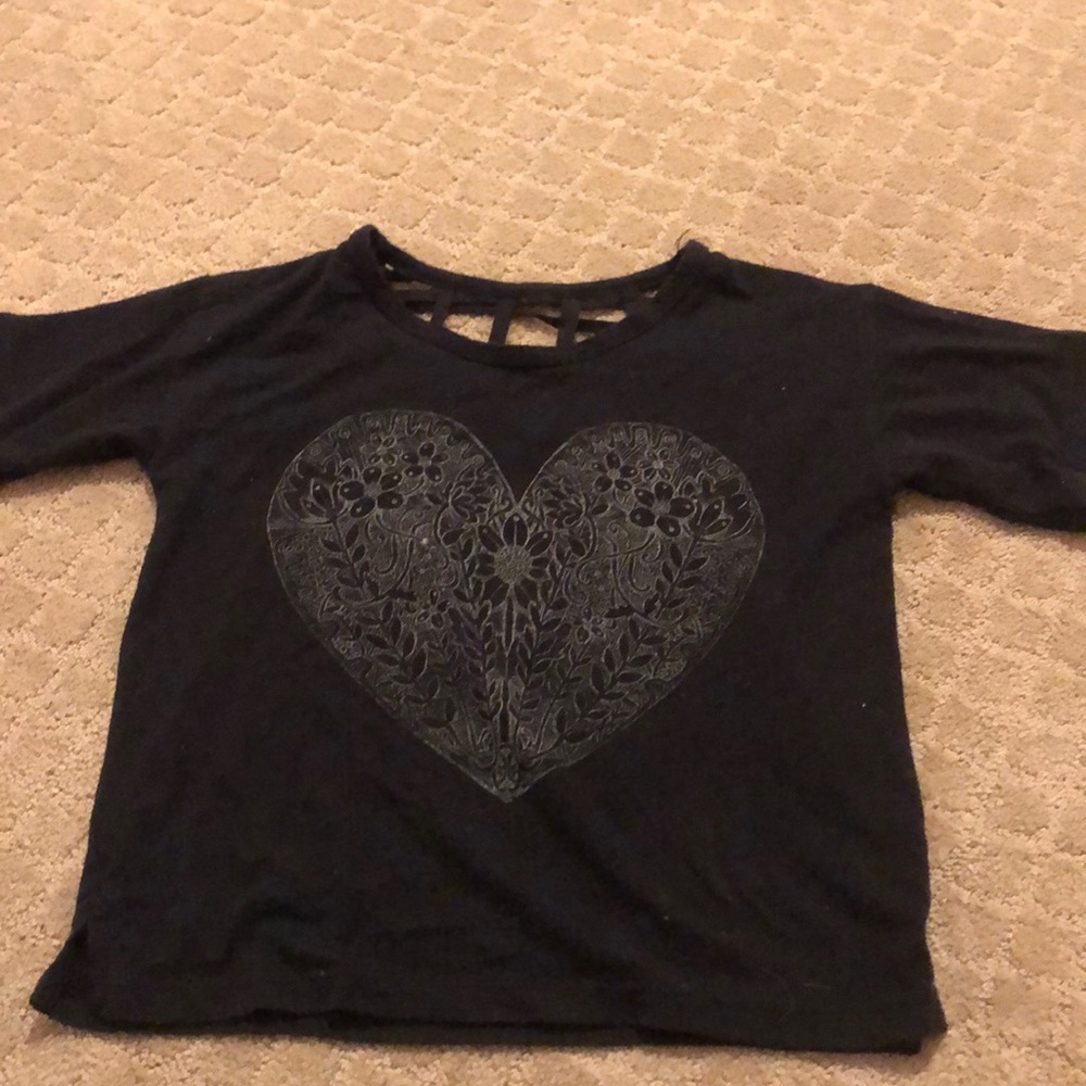 black shirt with patterned heart